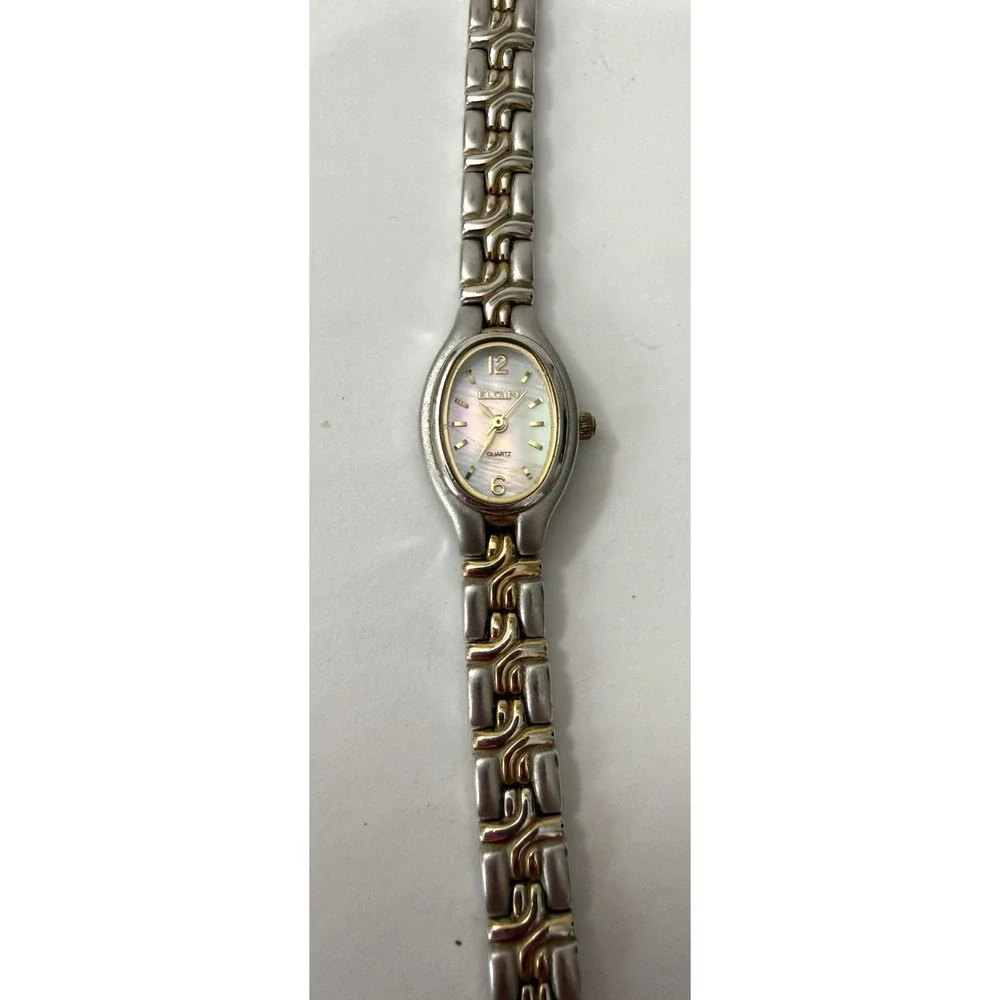 Lot of 4 Watches Quartz Gold Tone Silver Tone Seiko, Elgin, Timex, Vanity Fair